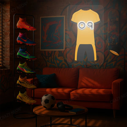 Yellow football jersey neon artwork with number 09 glowing on a wall