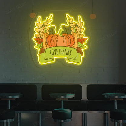 Pumpkin harvest give thanks neon sign in yellow