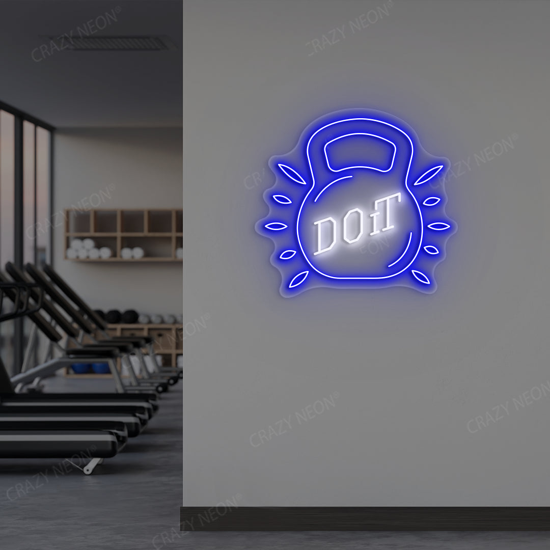 blue and white do it kettlebell gym neon sign mounted on a wall