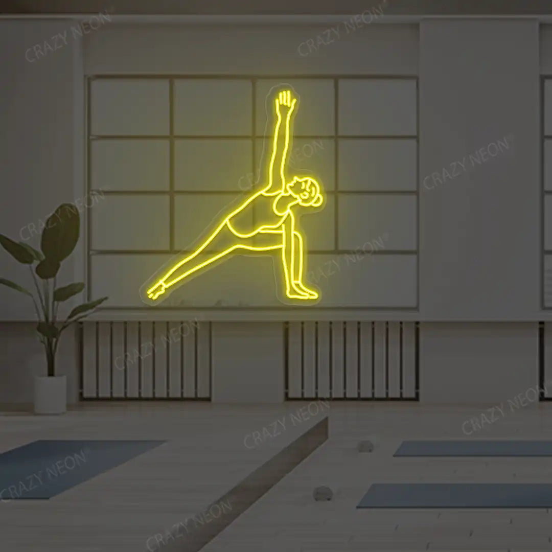 Utthita Parsvakonasana Yoga Neon Sign lighting up in yellow color in a yoga room