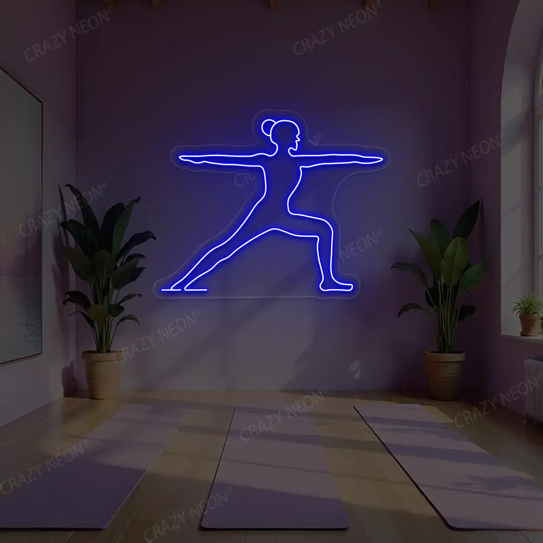 Virabhadrasana II Yoga Neon Sign lighting up in blue color in a yoga room