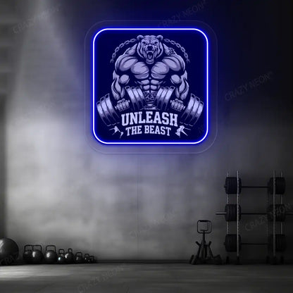 blue unleash the beast bear neon artwork mounted on a wall