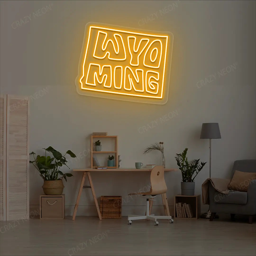 WYOMING Map Neon Sign lighting up in orange color in a room
