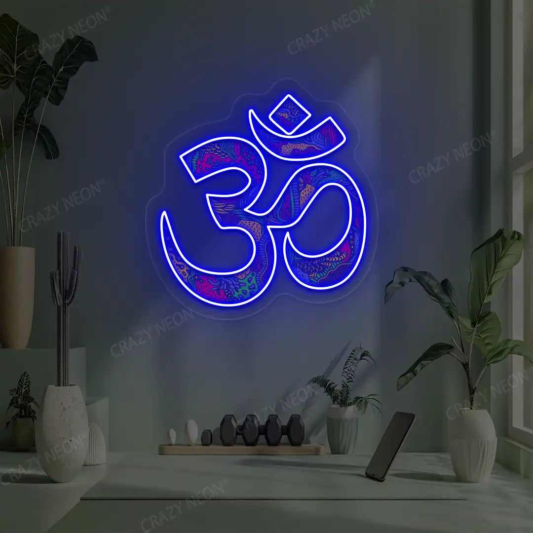 Psychedelic OM Neon Artwork lighting up in blue color in a yoga room