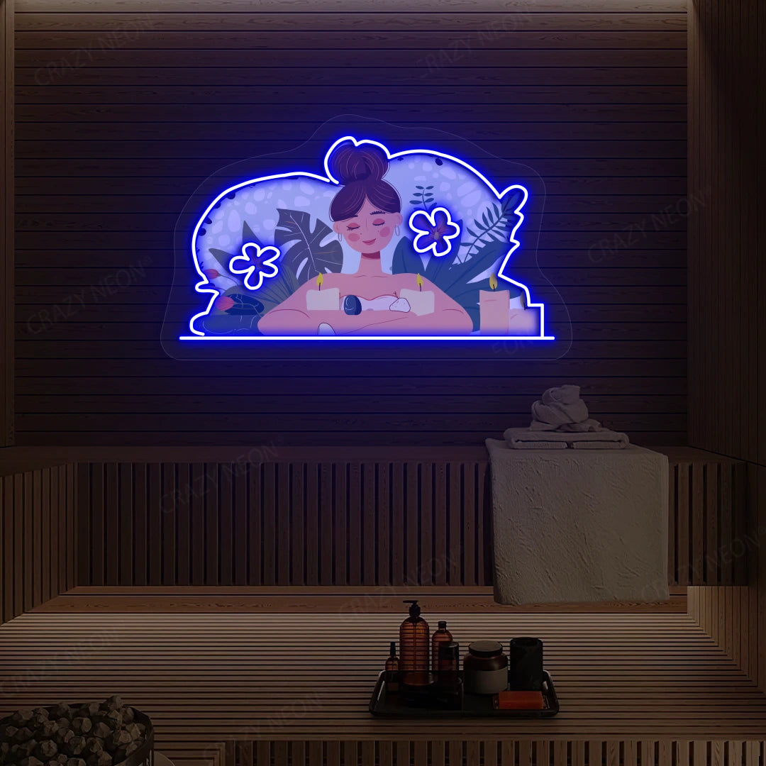 Aromatherapy Relaxation Neon Artwork lighting up in blue color on a wooden spa wall