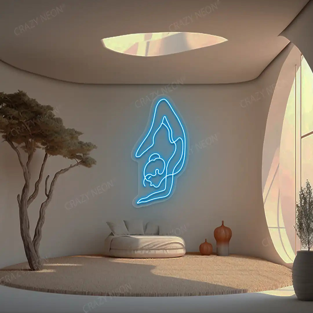 Purna Vrishchikasana Yoga Neon Sign glowing in ice blue color in a yoga room