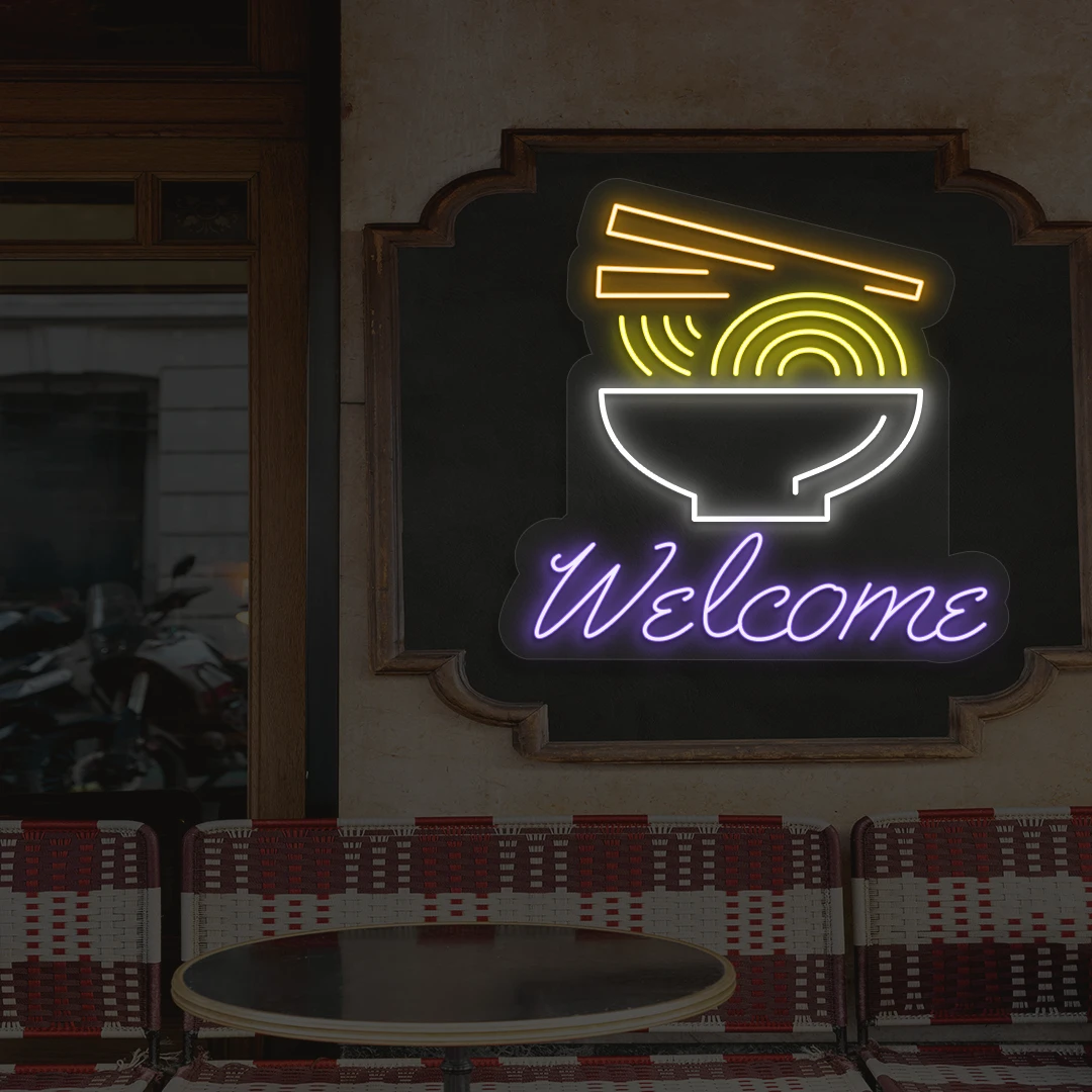 purple white yellow and orange welcome noodle bowl neon sign mounted on a wall
