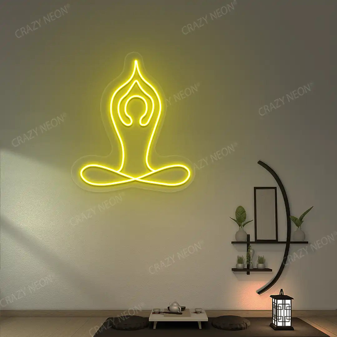 Padmasana With Raised Arms Yoga Neon Sign lighting up in yellow color in a yoga room