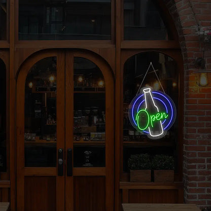 green beer open neon sign hanging on a window