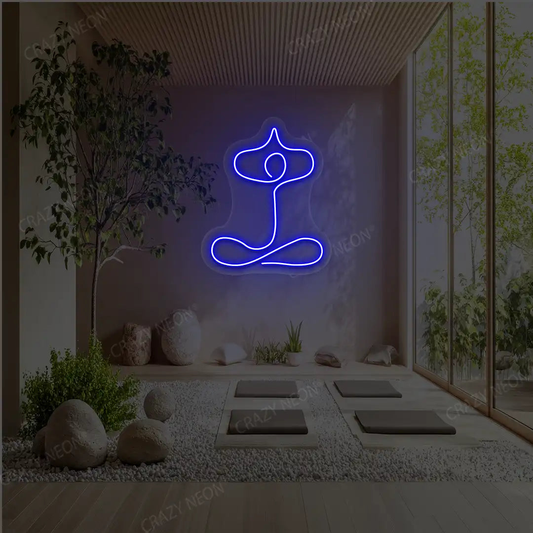 Sukhasana With Arms Raised Contour Yoga Neon Sign glowing in blue color in a yoga room