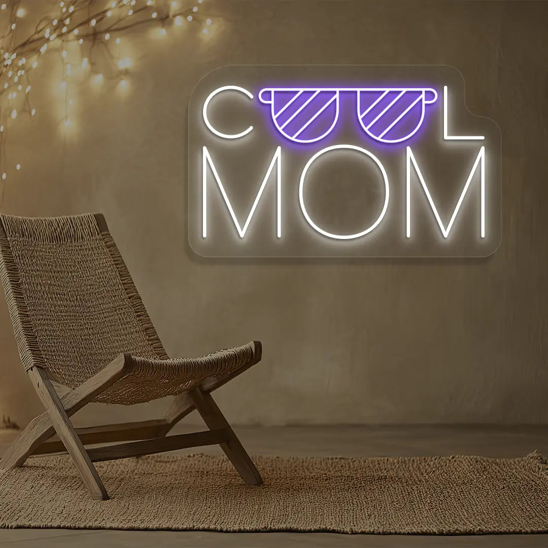 purple and white cool mom trendsetter neon sign mounted on a wall