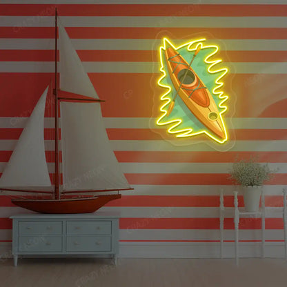 yellow floating kayak neon artwork mounted on a wall
