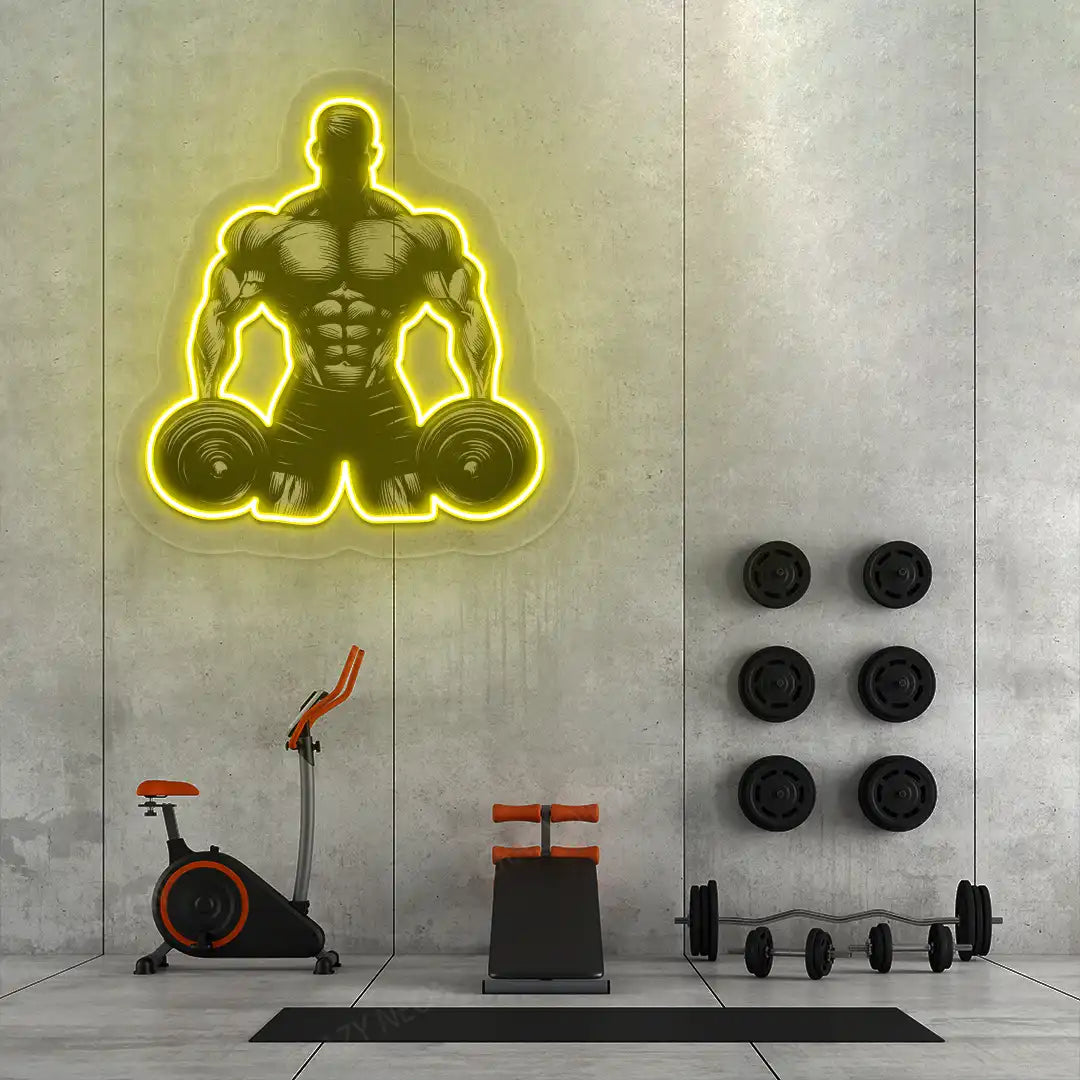 yellow muscle man dumbbell gym neon artwork mounted on a wall