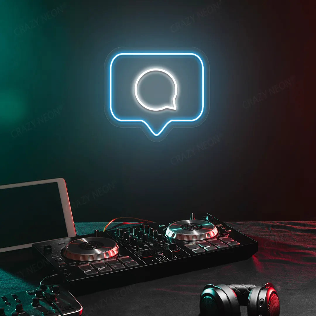 Comment Box Neon Sign in Ice Blue Color Mounted on a wall 