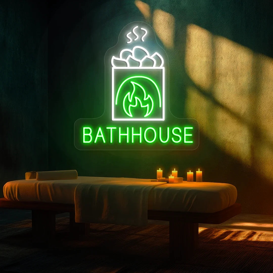 FireStone Bathhouse neon sign in green and white colors glowing in a spa room