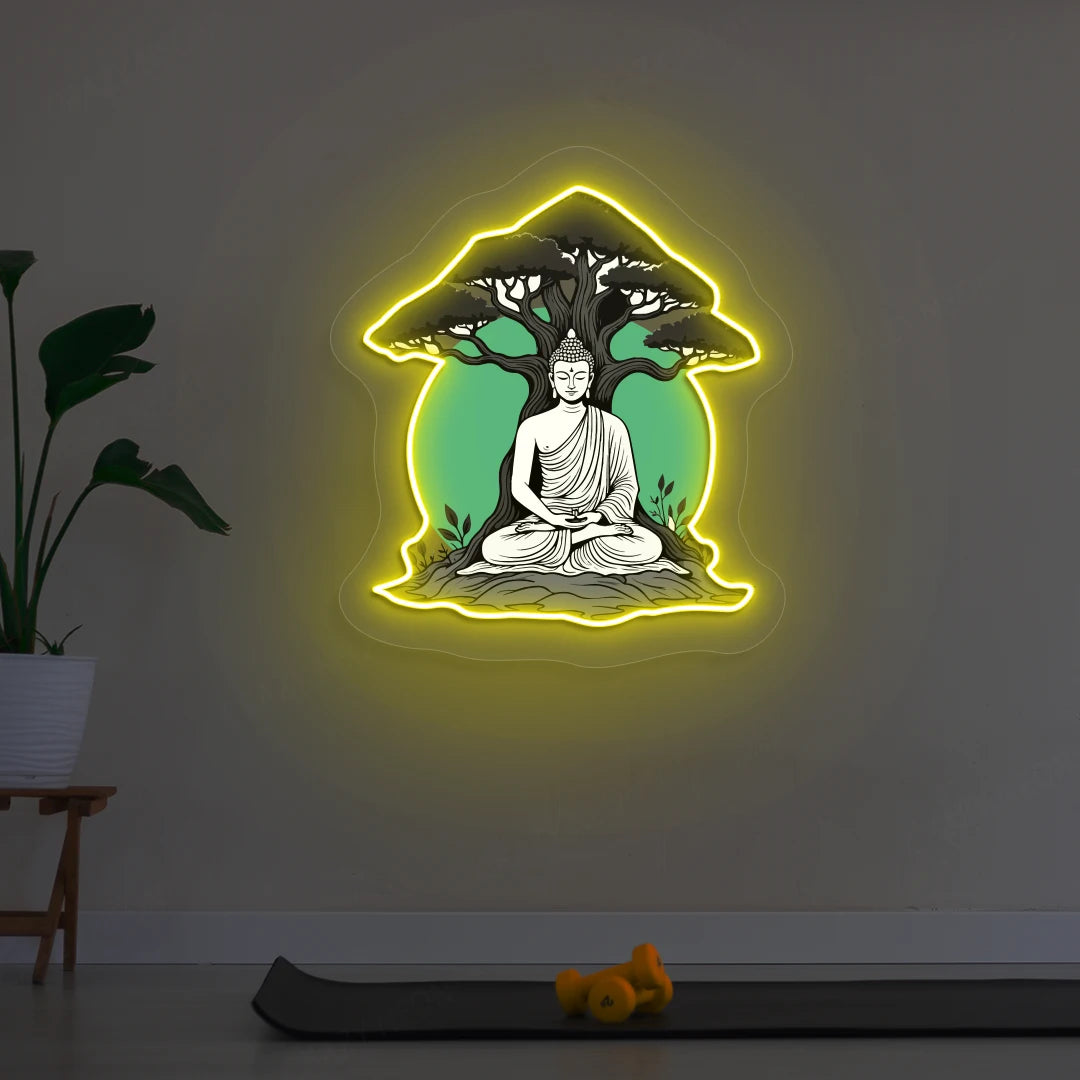 Buddha under Bodhi Neon Artwork lighting up in Yellow color in room