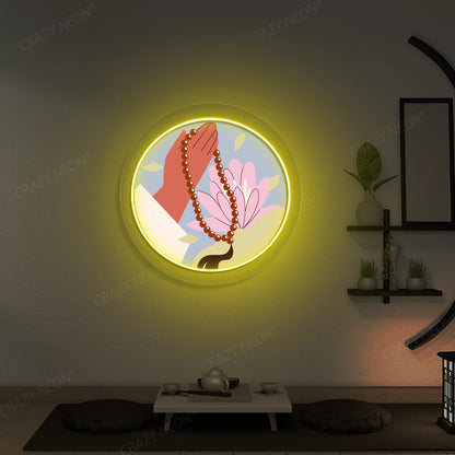 Lotus Japa Neon Artwork lighting up in yellow color in a yoga room