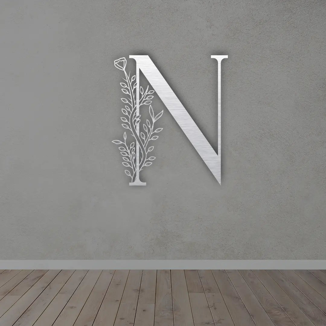 Metal Initial Sign in Silver colour mounted on wall 