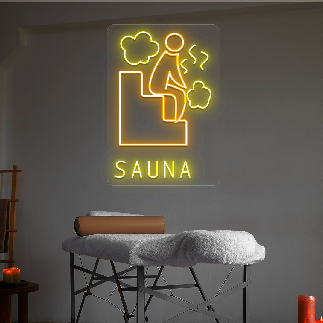 Sauna Relax neon sign in orange and yellow colors glowing in a spa room