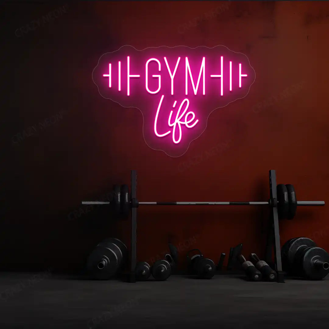 pink gym life neon sign mounted on a wall