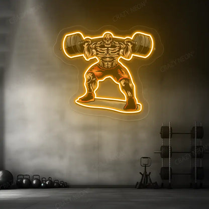 orange skull powerlifter gym neon artwork mounted on a wall