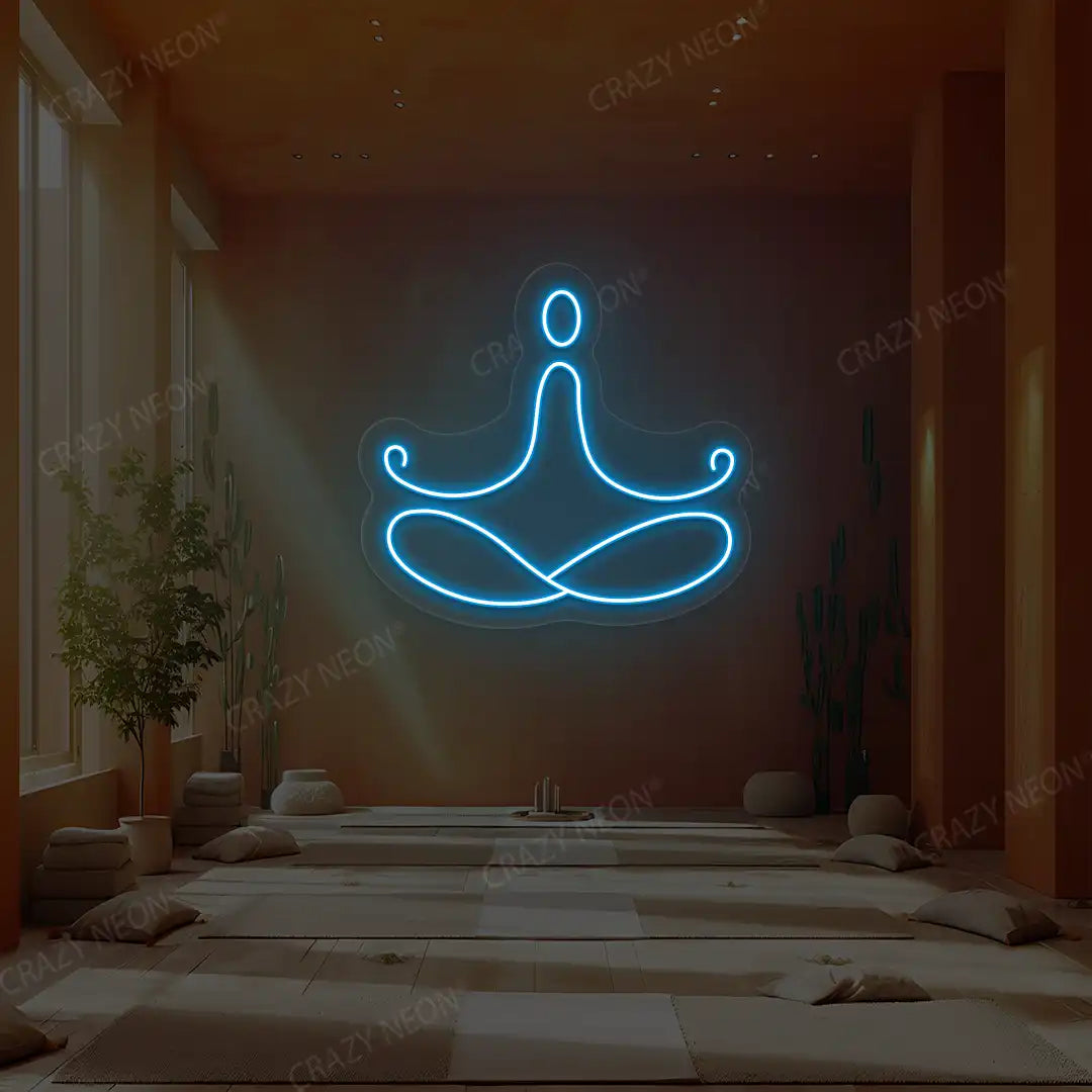 Padmasana Yoga Neon Sign lighting up in ice blue color in a yoga room