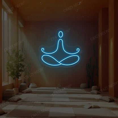 Padmasana Yoga Neon Sign lighting up in ice blue color in a yoga room