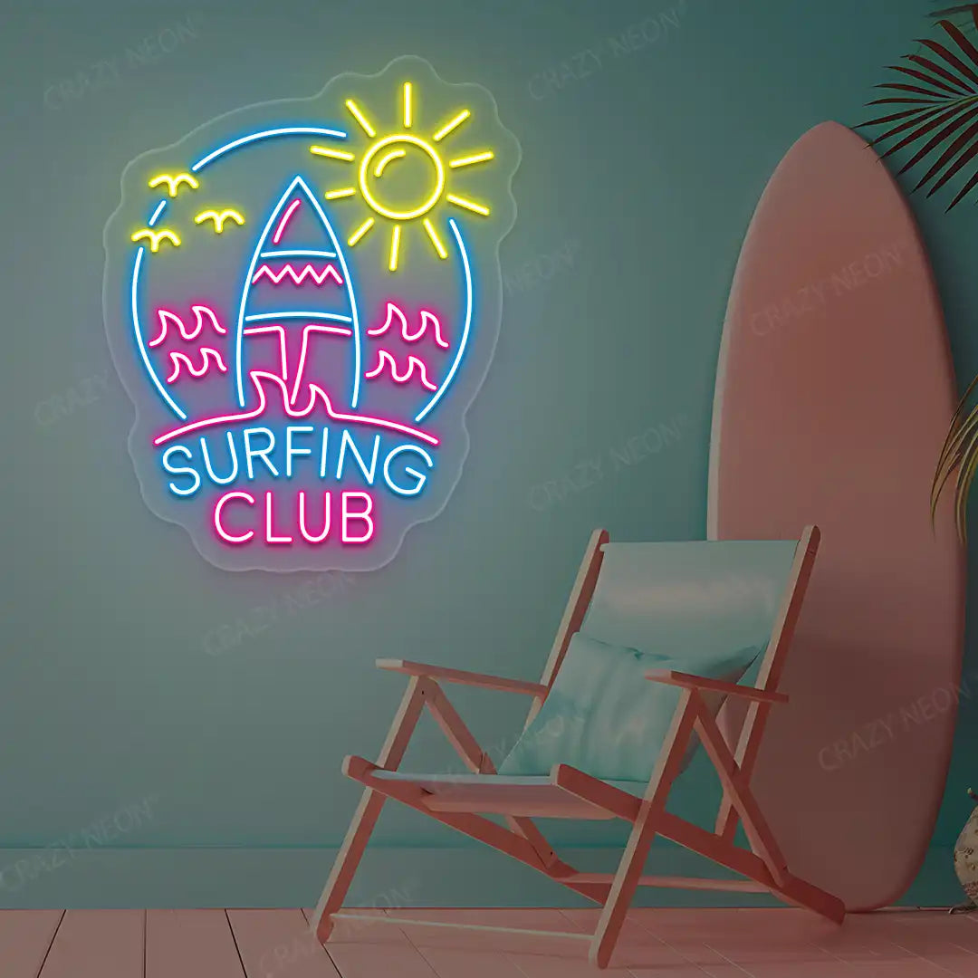 ice blue pink and yellow surfing club beach neon sign mounted on a wall