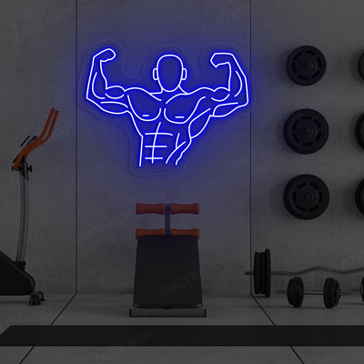 blue flexing bodybuilder gym neon sign mounted on a wall