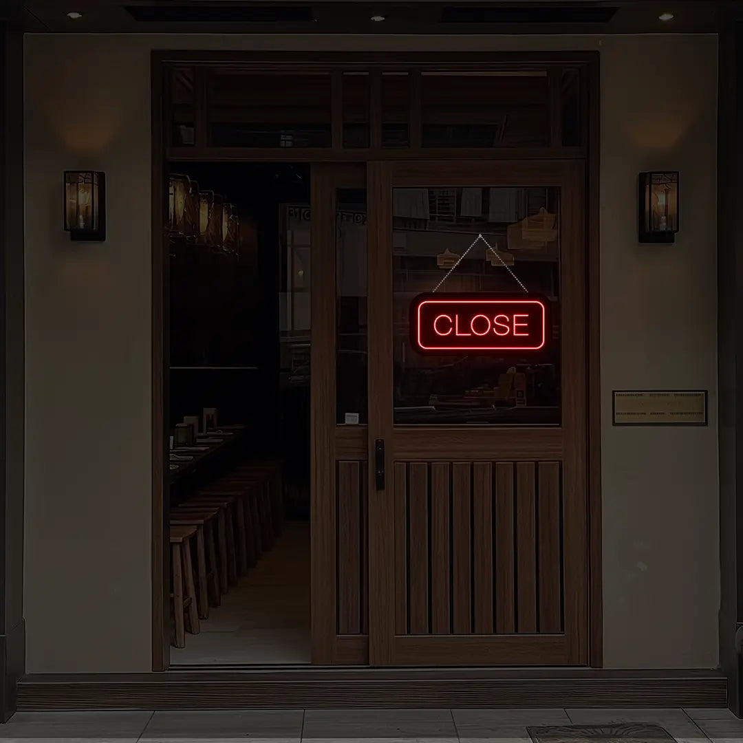 red close neon sign hanging on a shop door