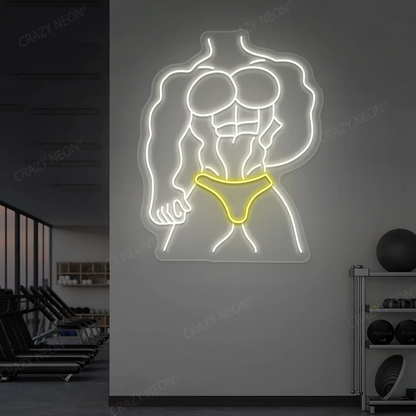yellow and white physique pro neon sign mounted on a wall