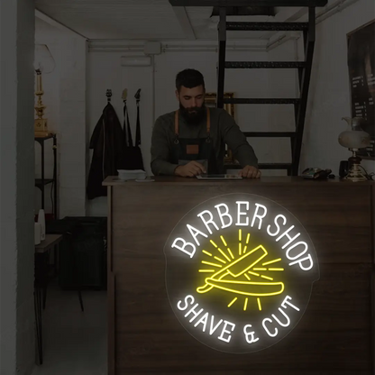Barber Shop Shave & Cut Neon Sign in White and Yellow Colour mounted on wall