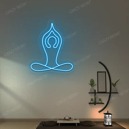 Padmasana With Raised Arms Yoga Neon Sign lighting up in iceblue color in a yoga room