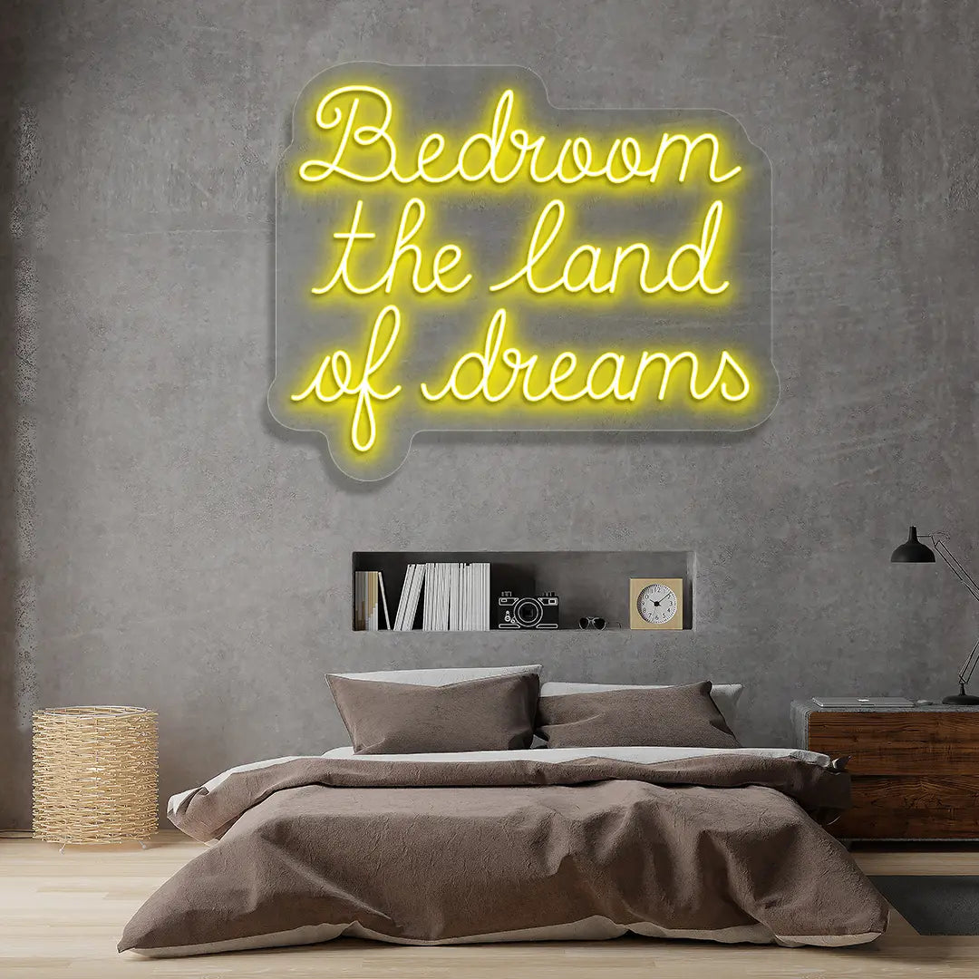 yellow bedroom the land of dreams neon sign mounted on a wall