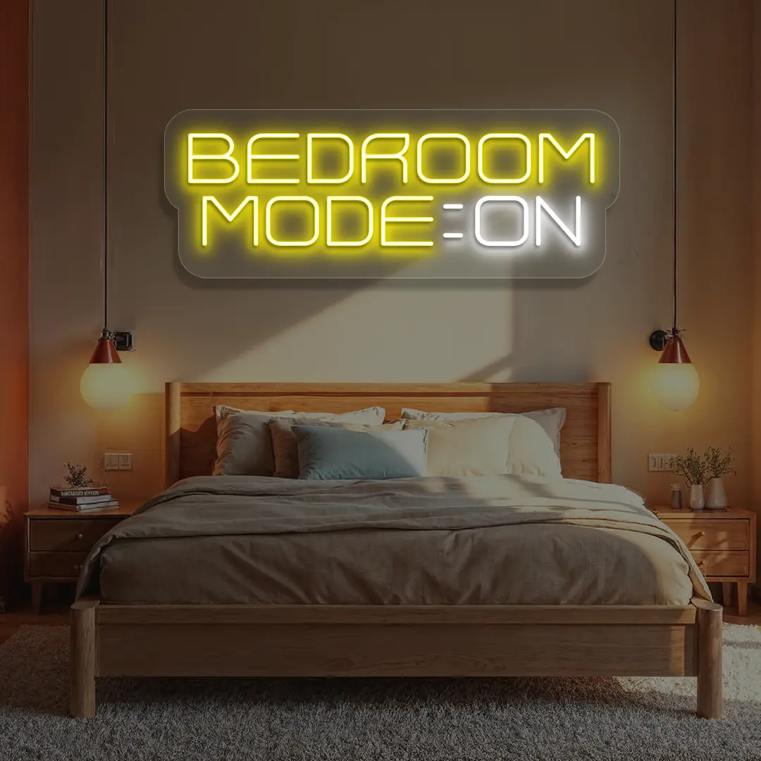 yellow and white bedroom mode on neon sign mounted on a wall
