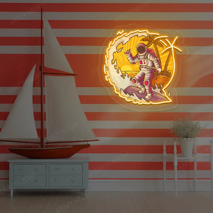 orange astronaut surfing neon artwork mounted on a wall