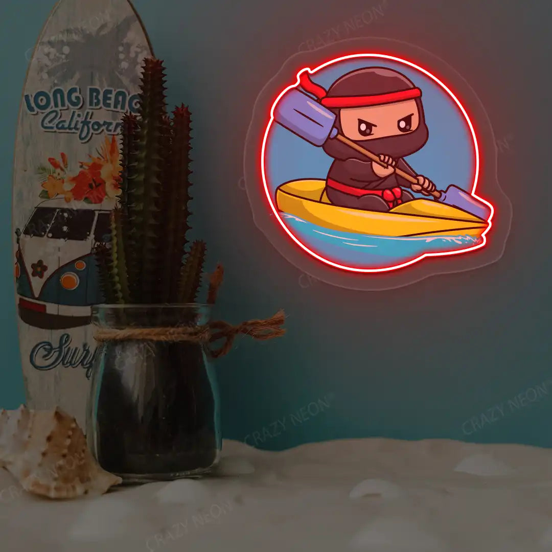 red ninja kayaking neon artwork mounted on a wall