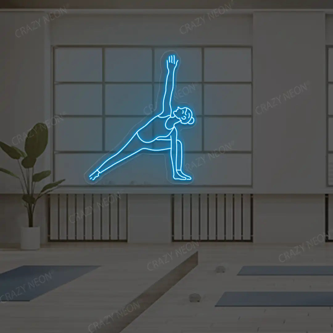 Utthita Parsvakonasana Yoga Neon Sign lighting up in ice blue color in a yoga room