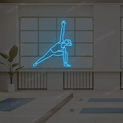 Utthita Parsvakonasana Yoga Neon Sign lighting up in ice blue color in a yoga room