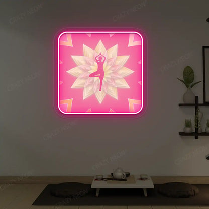 Vrikshasana Mandala Yoga Neon Artwork lighting up in pink color in a yoga room