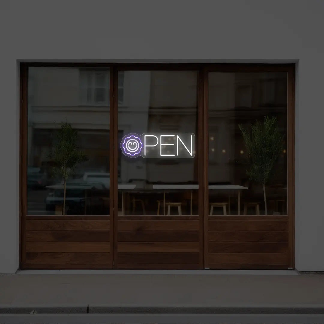 purple flower open neon sign hanging on a window