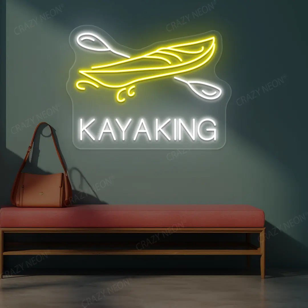 yellow and white kayaking boat neon sign mounted on a wall