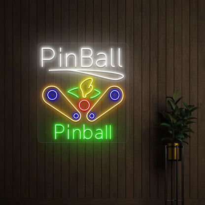 Multi color pinball wizard vintage neon sign mounted on a wall