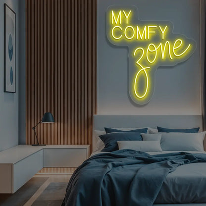 yellow my comfy zone neon sign mounted on a wall