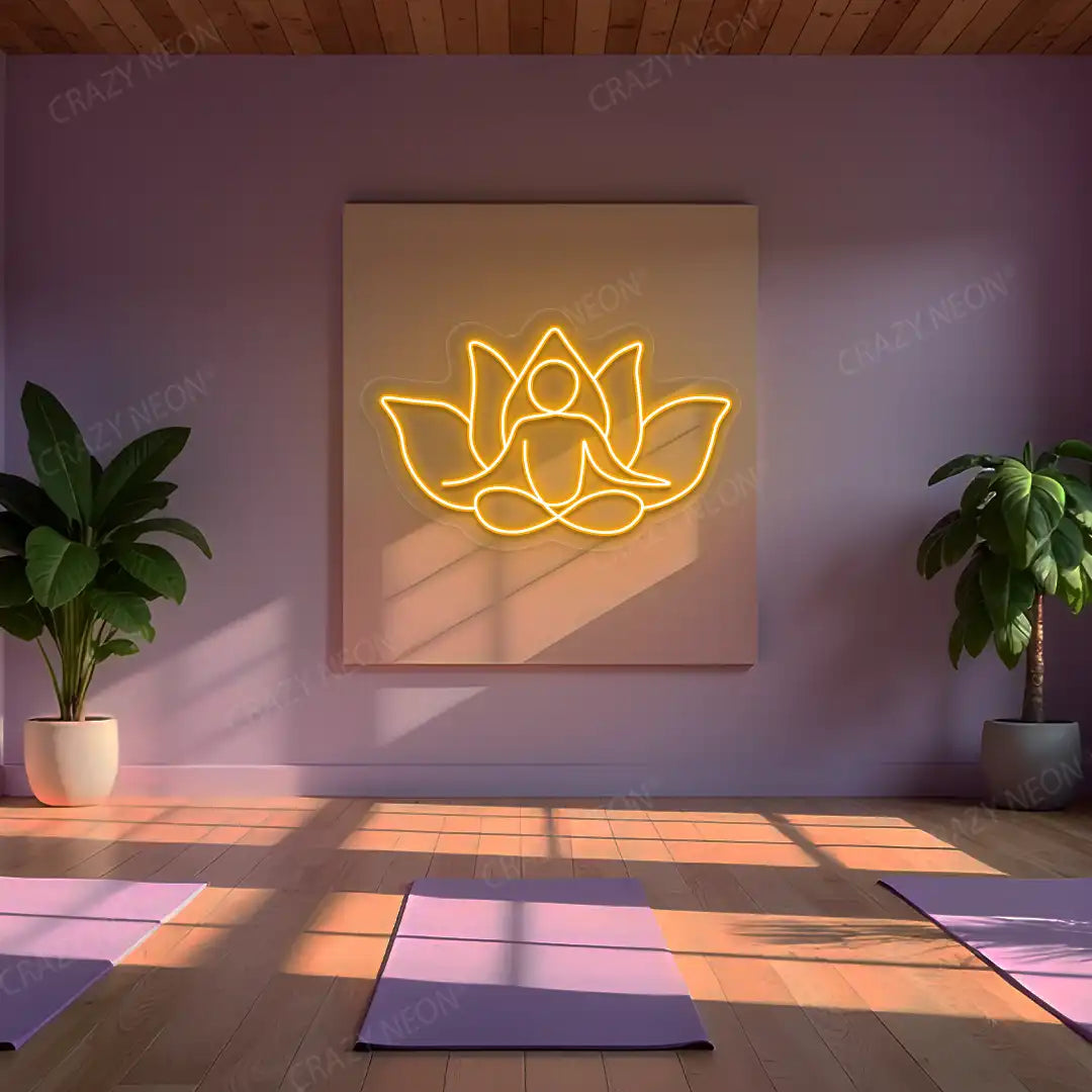 Lotus Meditation Neon Sign lighting up in orange color in a yoga room