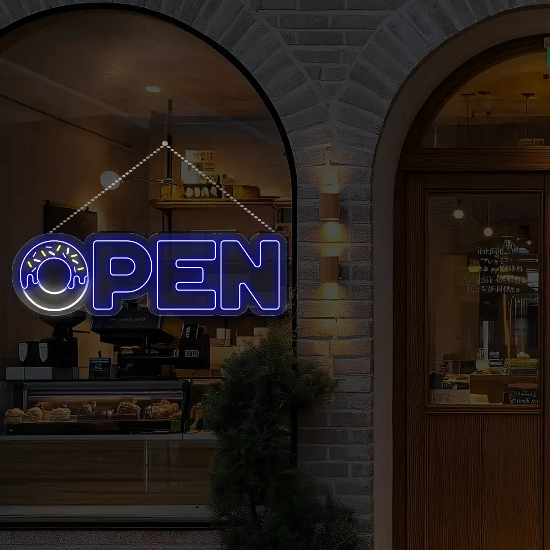 blue donut open neon sign hanging on a window