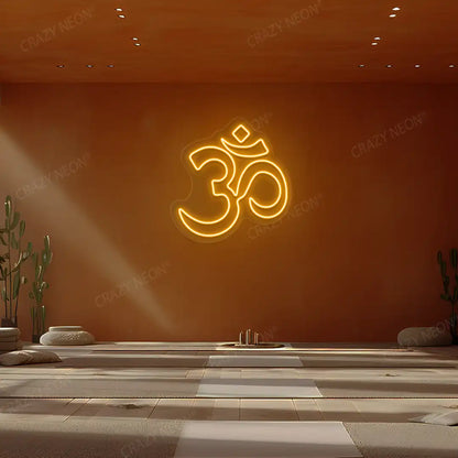 Om Symbol Neon Sign lighting up in orange color in a yoga room