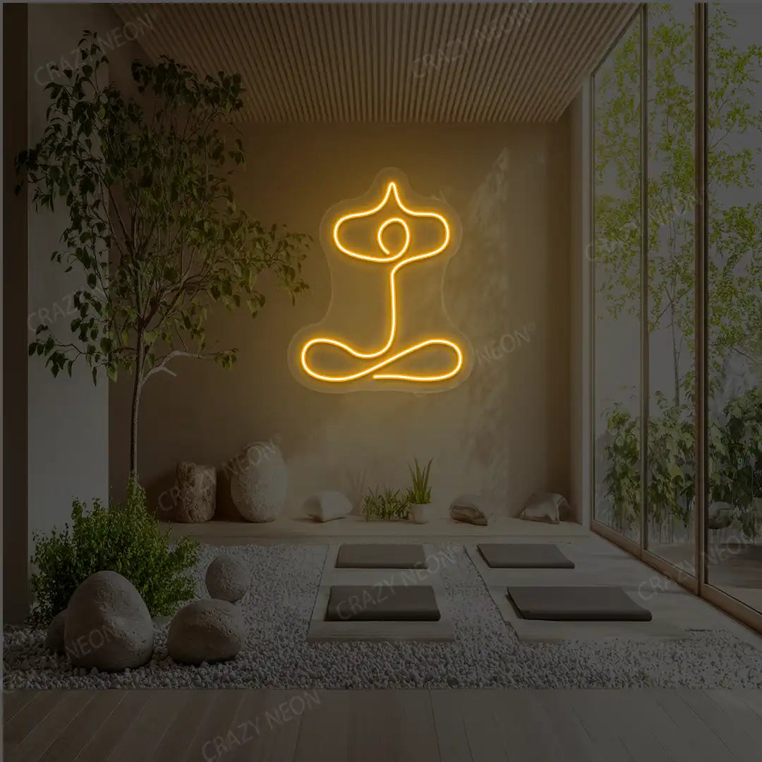 Sukhasana With Arms Raised Contour Yoga Neon Sign glowing in orange color in a yoga room