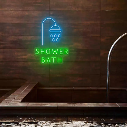 Shower Bath neon sign in ice blue and green colors glowing on a wooden wall