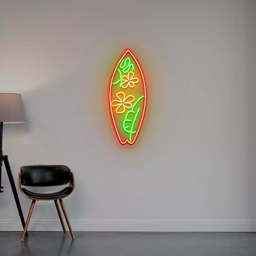 orange green and red flower surfboard neon sign mounted on a wall